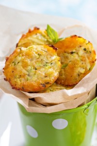 Baked zucchini appetizers with cheese and herbs